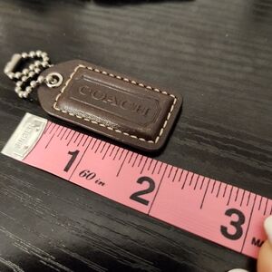 Coach hang tag dark brown